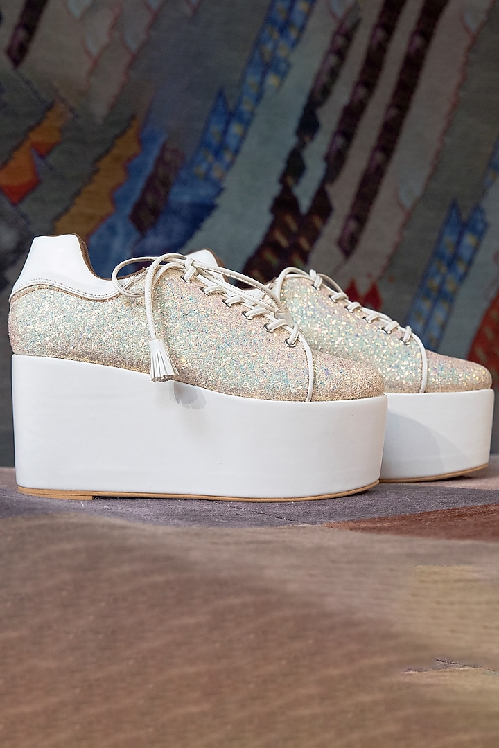 White Faux Leather Embroidered Sneaker Wedges by TIESTA at Pernia's Pop Up Shop