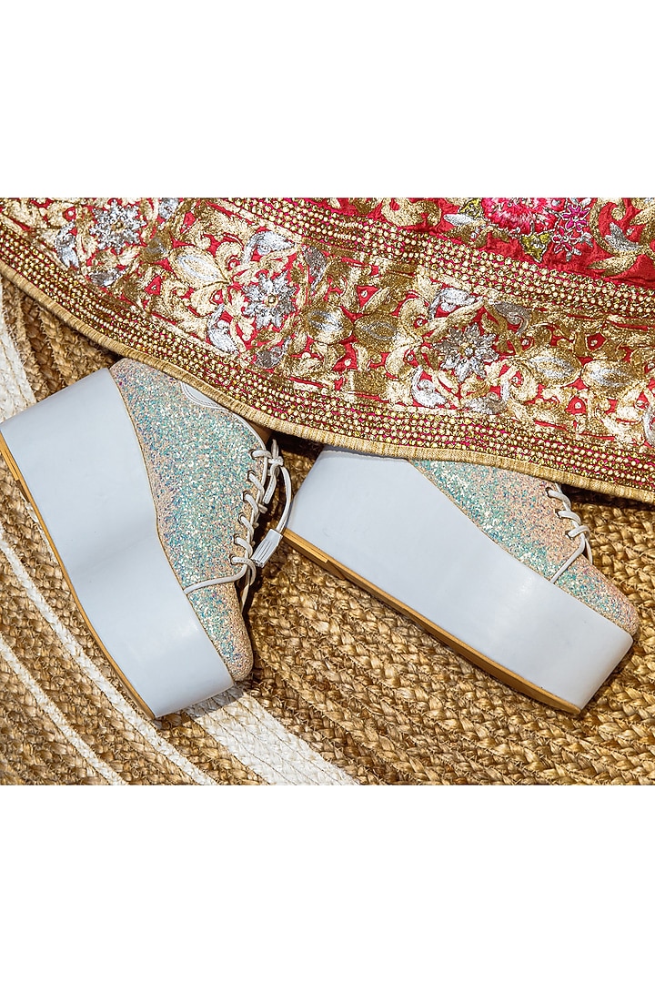 White Faux Leather Embroidered Sneaker Wedges by TIESTA at Pernia's Pop Up Shop