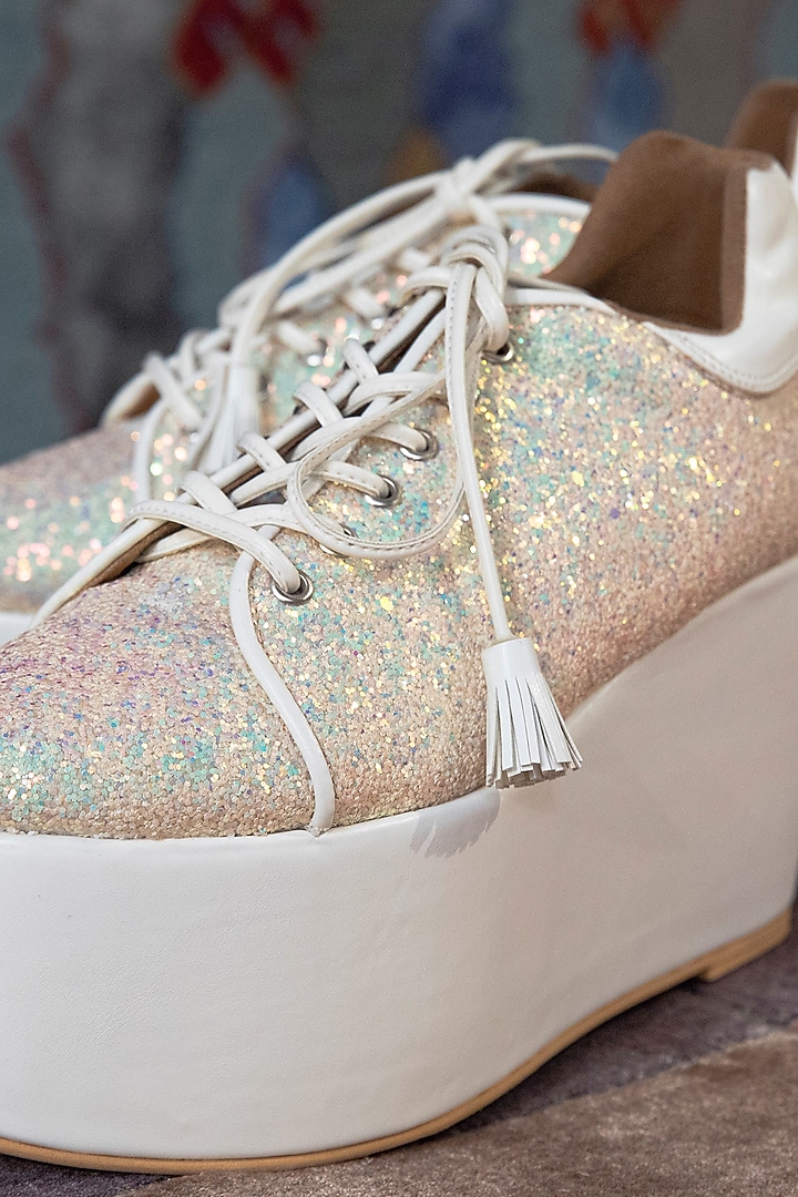 White Faux Leather Embroidered Sneaker Wedges by TIESTA at Pernia's Pop Up Shop