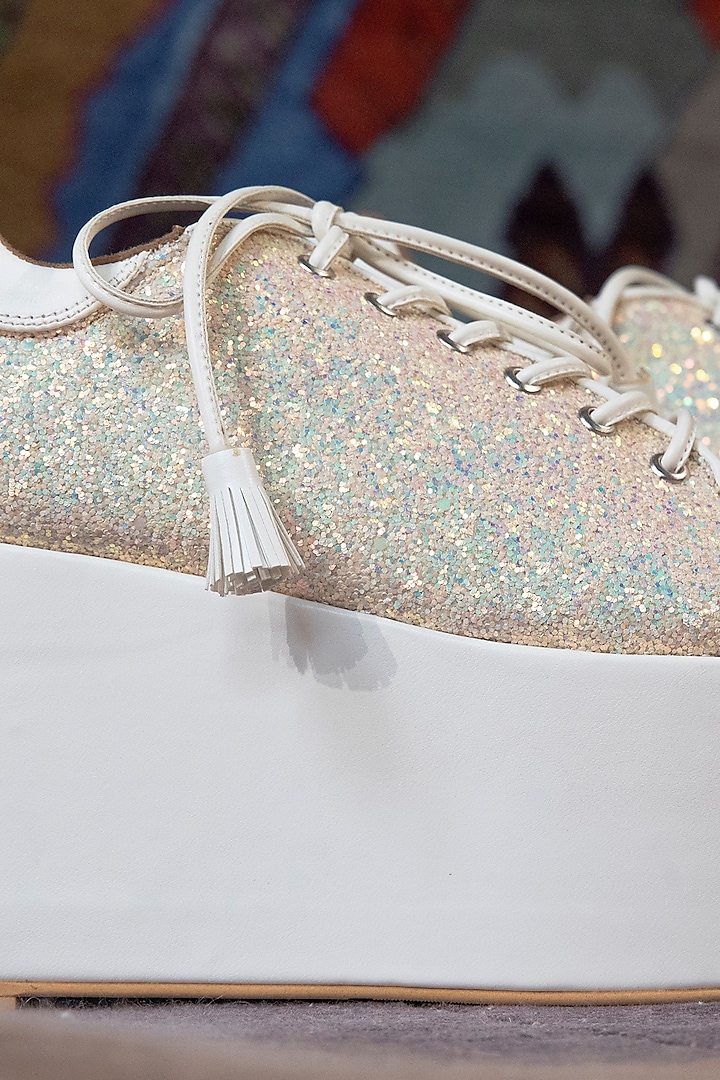 White Faux Leather Embroidered Sneaker Wedges by TIESTA at Pernia's Pop Up Shop
