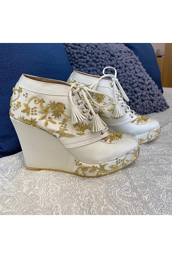 White Faux Leather Hand Embroidered Sneaker Wedges by TIESTA at Pernia's Pop Up Shop