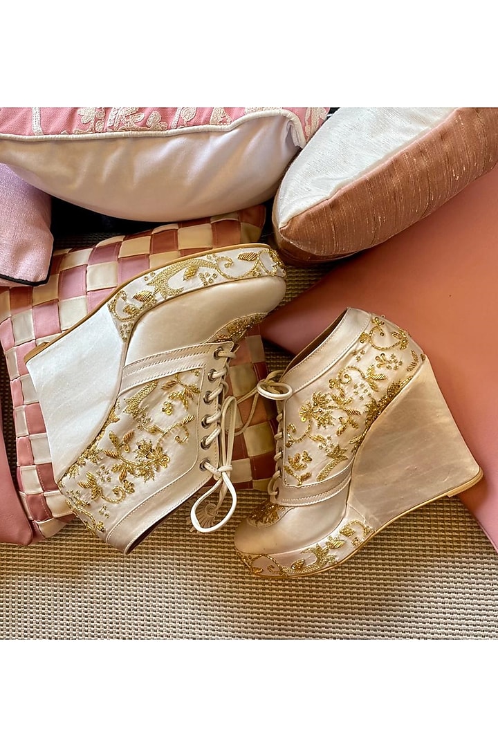 White Faux Leather Hand Embroidered Sneaker Wedges by TIESTA at Pernia's Pop Up Shop