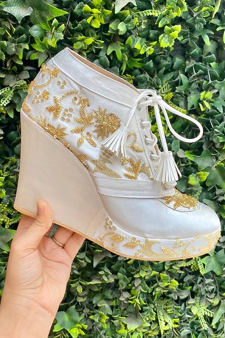 White Faux Leather Hand Embroidered Sneaker Wedges by TIESTA at Pernia's Pop Up Shop