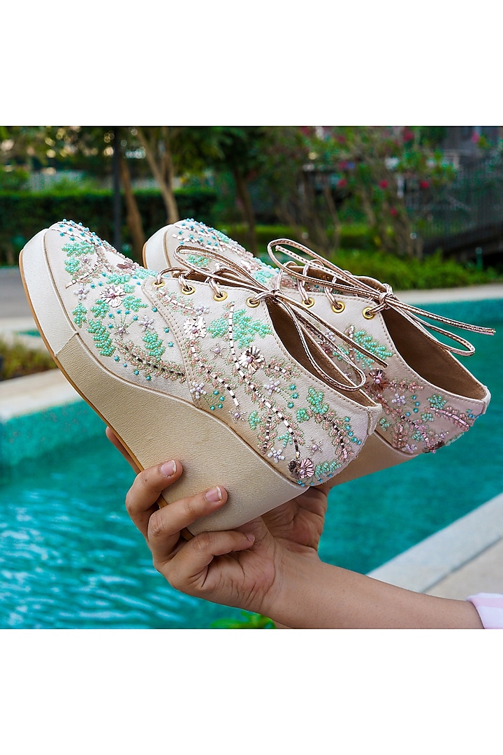 Gold Faux Leather Hand Embroidered Sneaker Wedges by TIESTA at