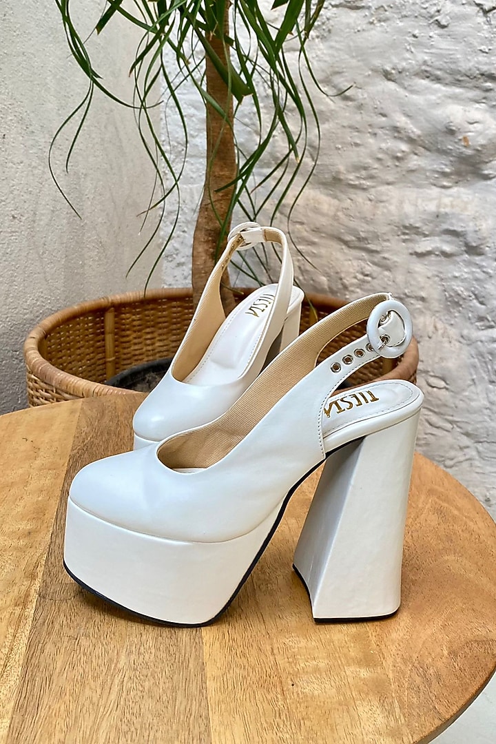 White Faux Leather Block Heels by TIESTA at Pernia's Pop Up Shop