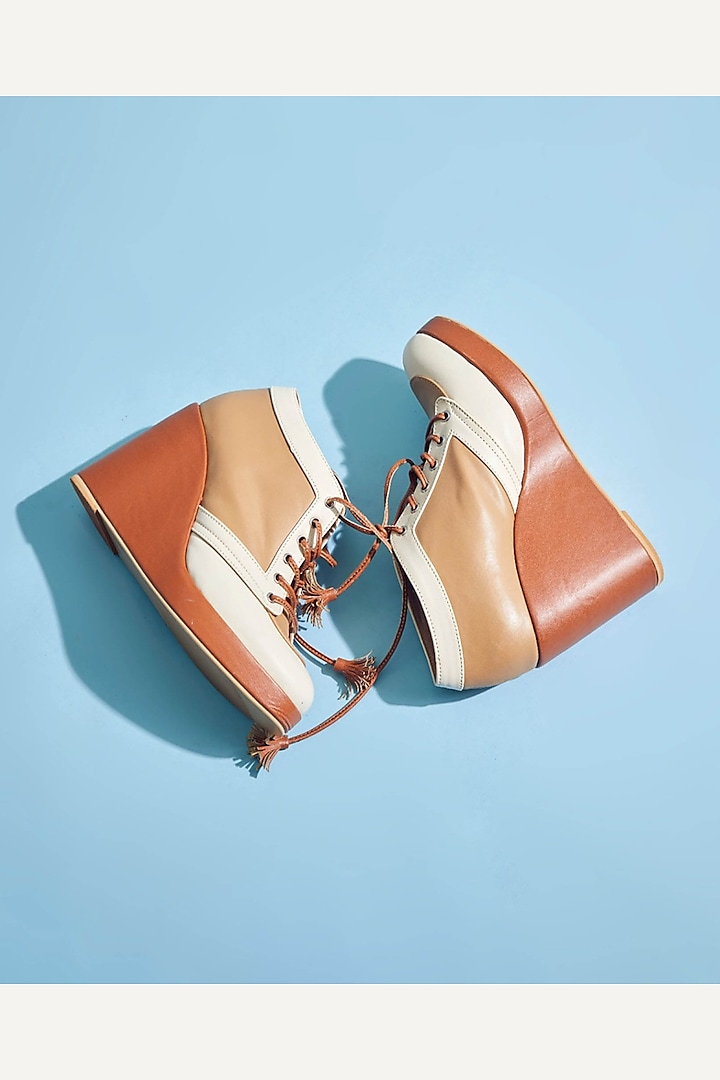 Brown Faux Leather Sneaker Wedges by TIESTA at Pernia's Pop Up Shop