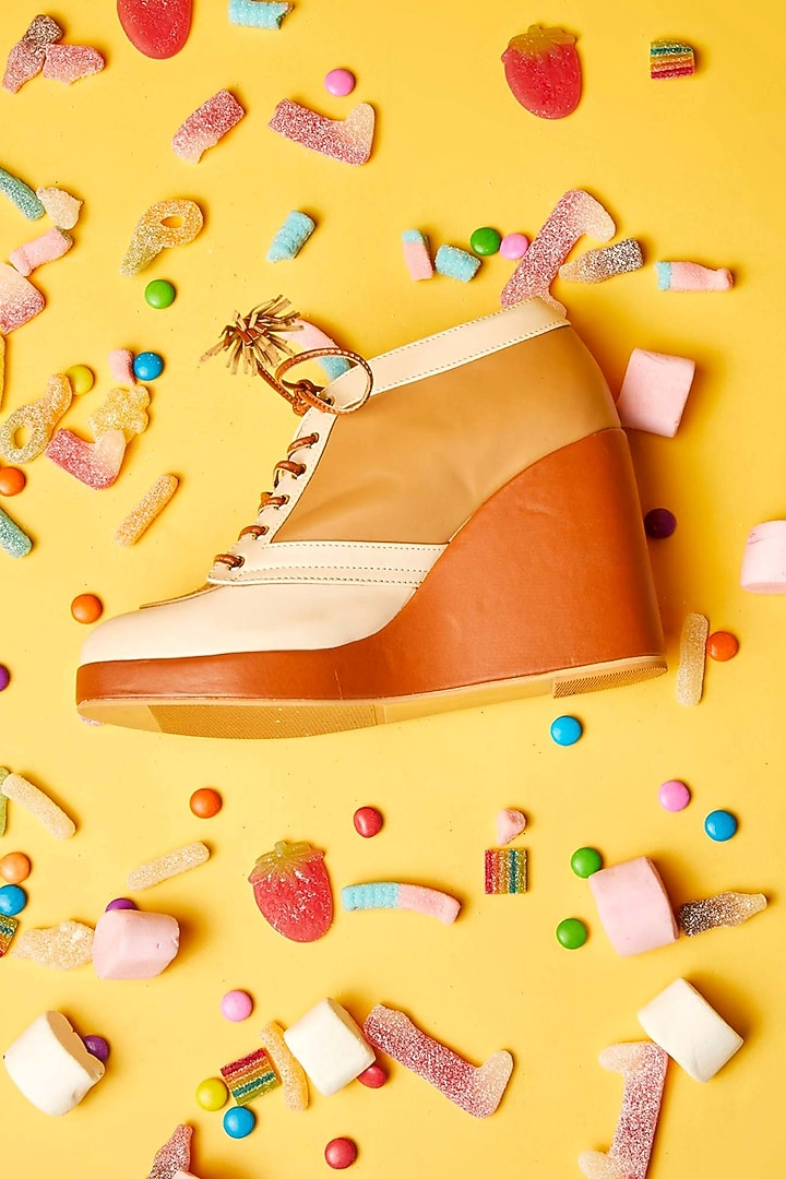 Brown Faux Leather Sneaker Wedges by TIESTA at Pernia's Pop Up Shop