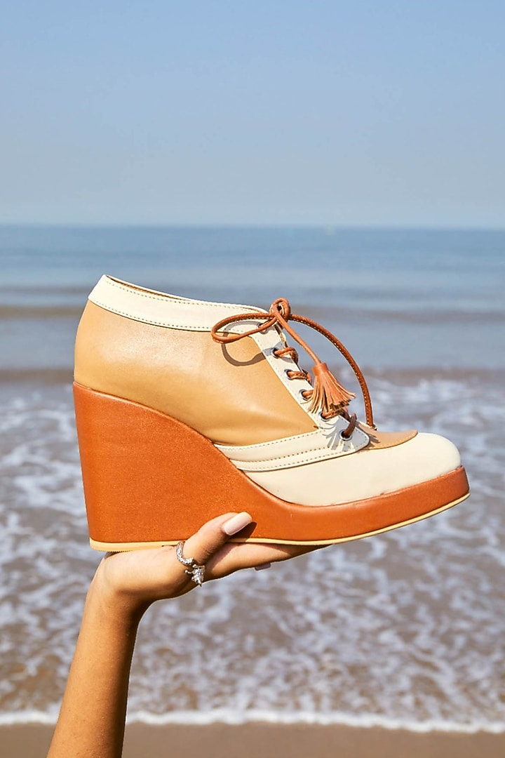 Brown Faux Leather Sneaker Wedges by TIESTA at Pernia's Pop Up Shop