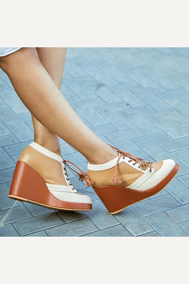 Brown Faux Leather Sneaker Wedges by TIESTA at Pernia's Pop Up Shop