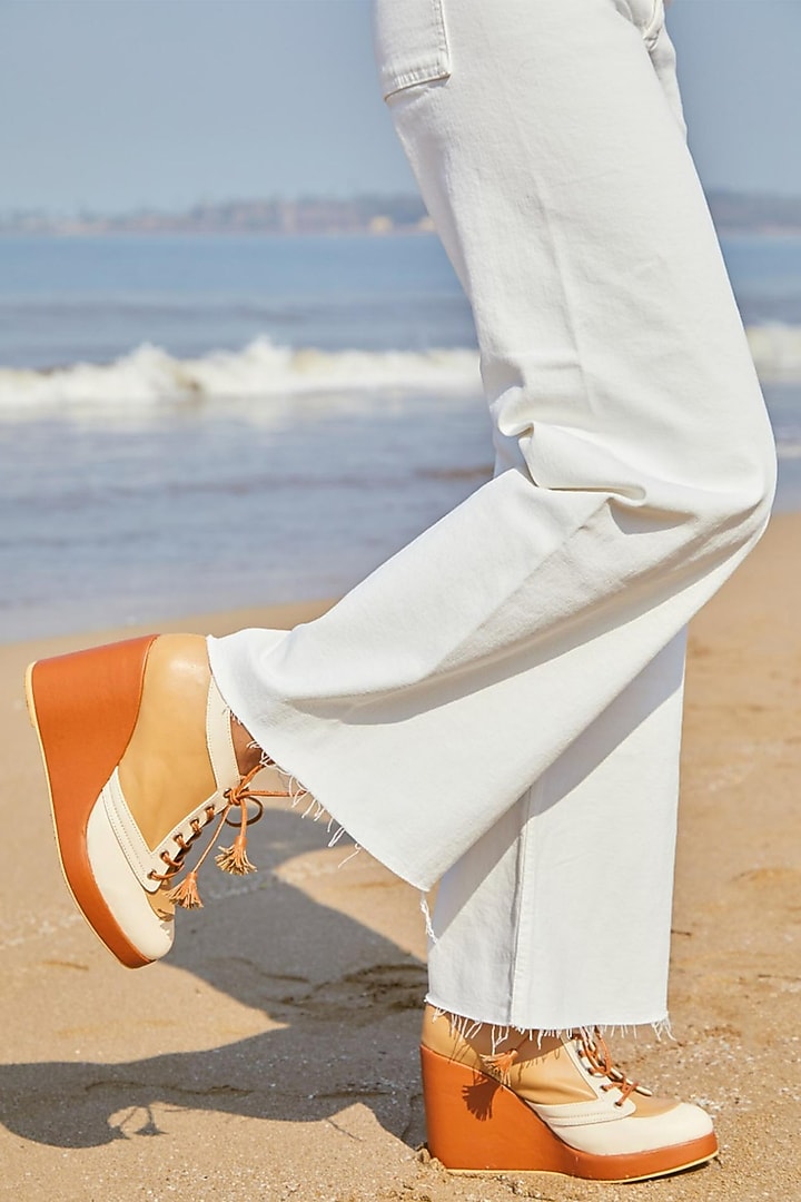 Brown Faux Leather Sneaker Wedges by TIESTA at Pernia's Pop Up Shop