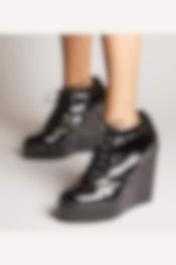 Black Faux Leather Sneaker Wedges by TIESTA