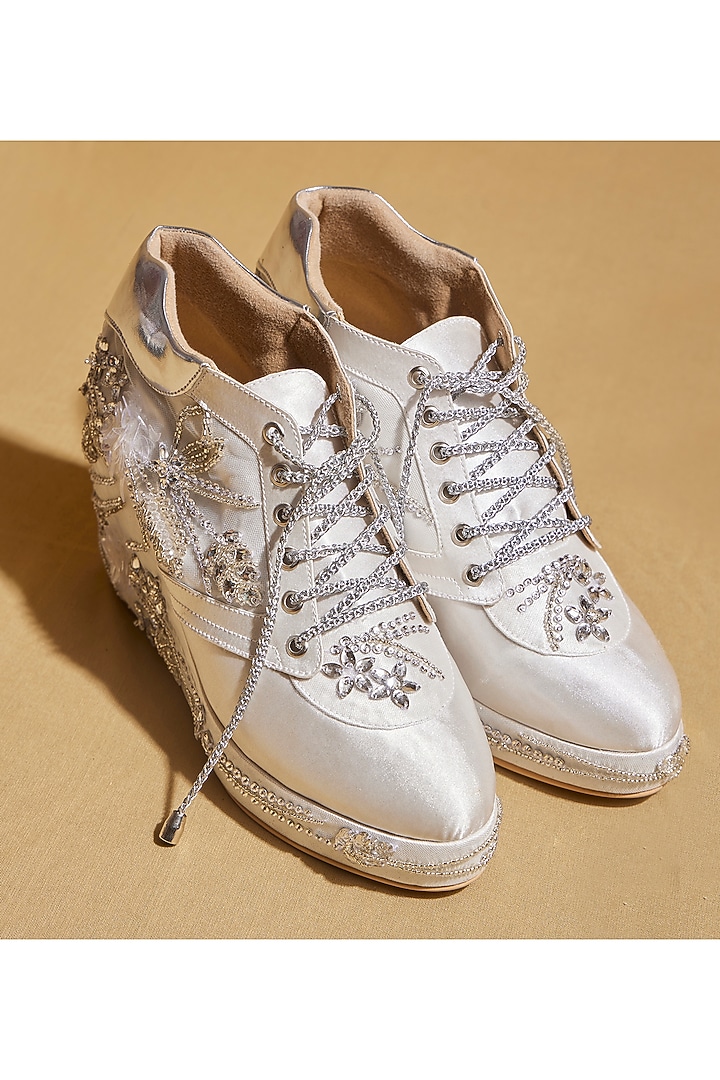 White Satin Floral Embellished Wedges Sneakers by TIESTA at Pernia's Pop Up Shop