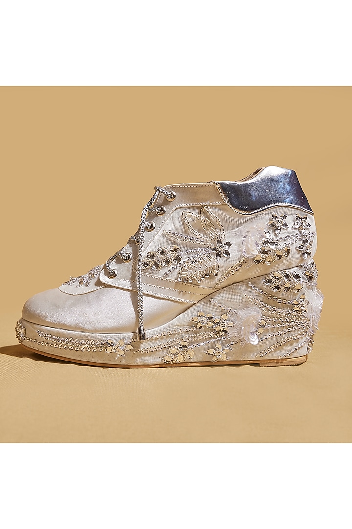 White Satin Floral Embellished Wedges Sneakers by TIESTA at Pernia's Pop Up Shop