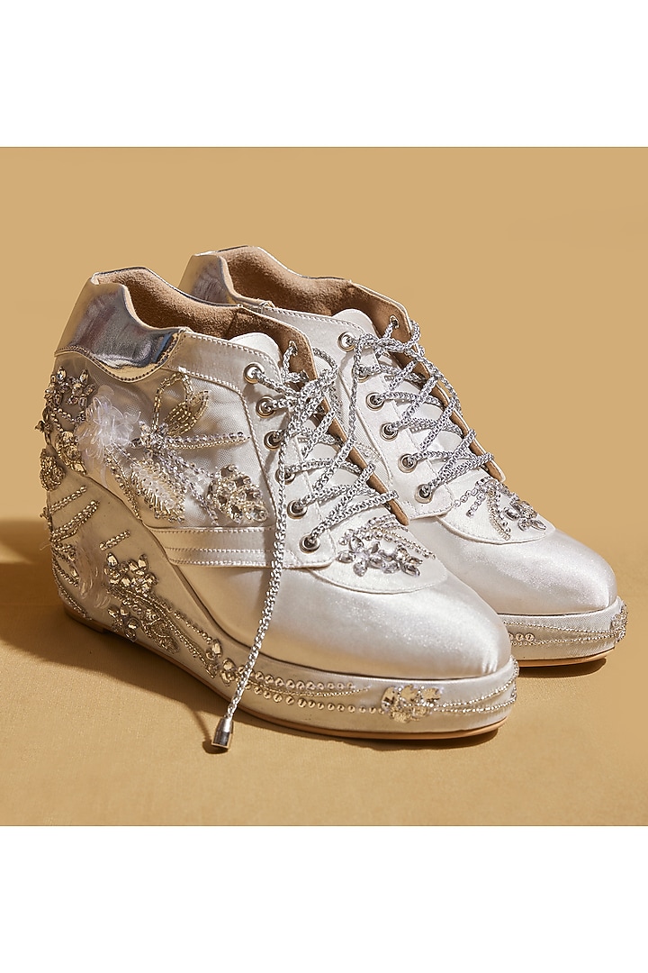 White Satin Floral Embellished Wedges Sneakers by TIESTA at Pernia's Pop Up Shop