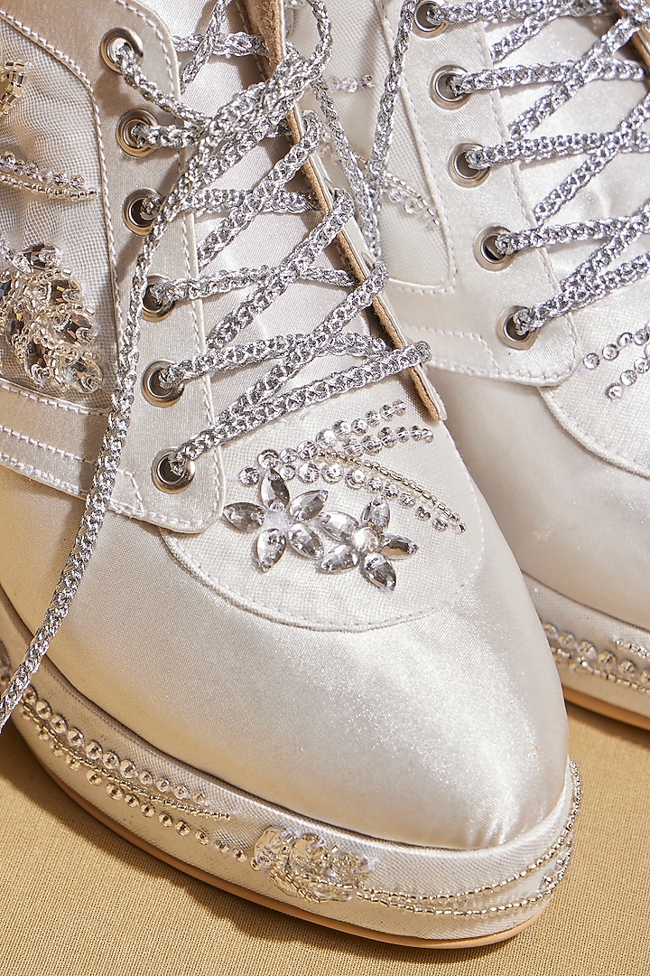 White Satin Floral Embellished Wedges Sneakers by TIESTA at Pernia's Pop Up Shop
