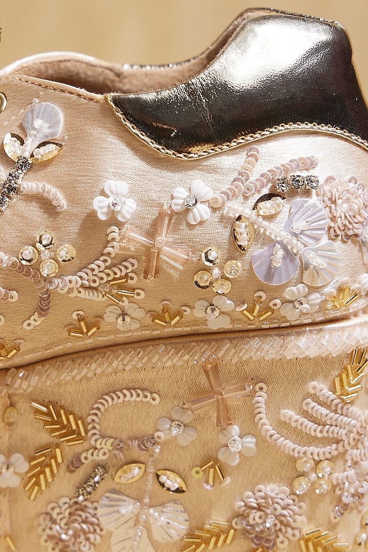 Gold Satin Floral Hand Embroidered Wedge Sneakers by TIESTA at Pernia's Pop Up Shop