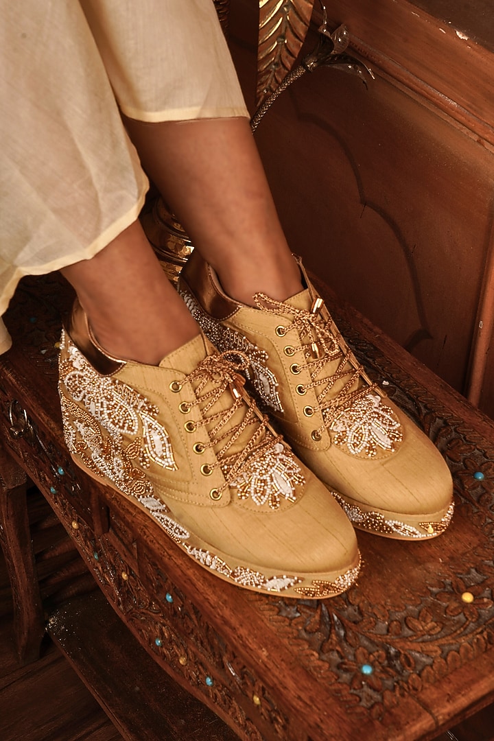 Gold Raw Silk Zari & Pearl Embroidered Wedge Sneakers by TIESTA at Pernia's Pop Up Shop