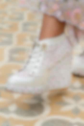 White Satin Floral Embroidered Sneaker Wedges by TIESTA at Pernia's Pop Up Shop