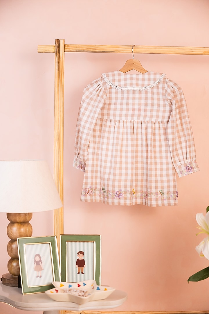 Beige & White Cotton Linen Embroidered Gingham Shirt For Girls by Tilsim by Sagarika Mehrotra at Pernia's Pop Up Shop