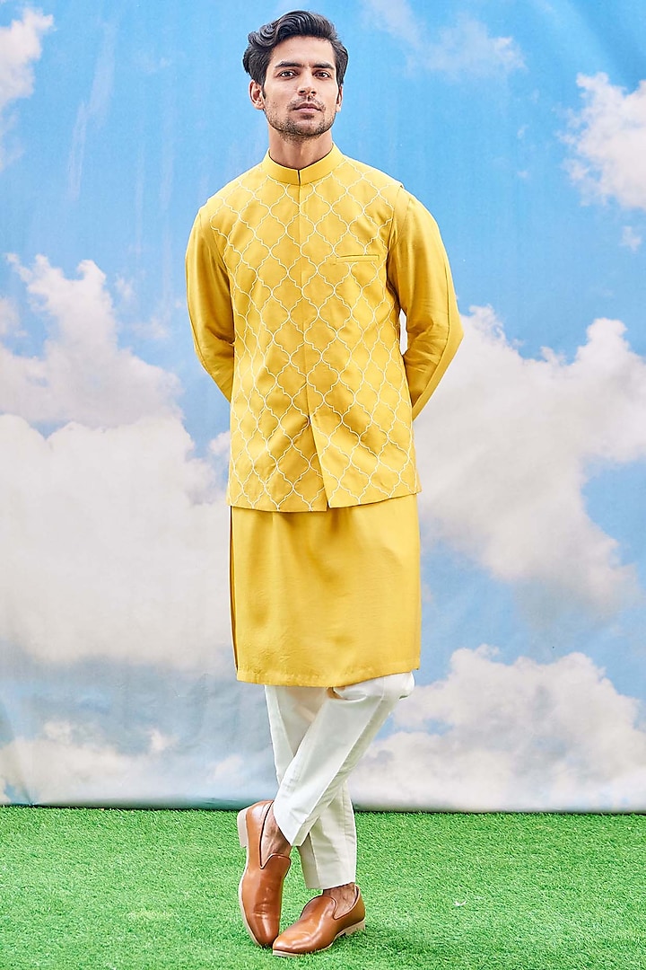 Yellow Silk Viscose Kurta Set With Bundi Jacket by TISASTUDIO