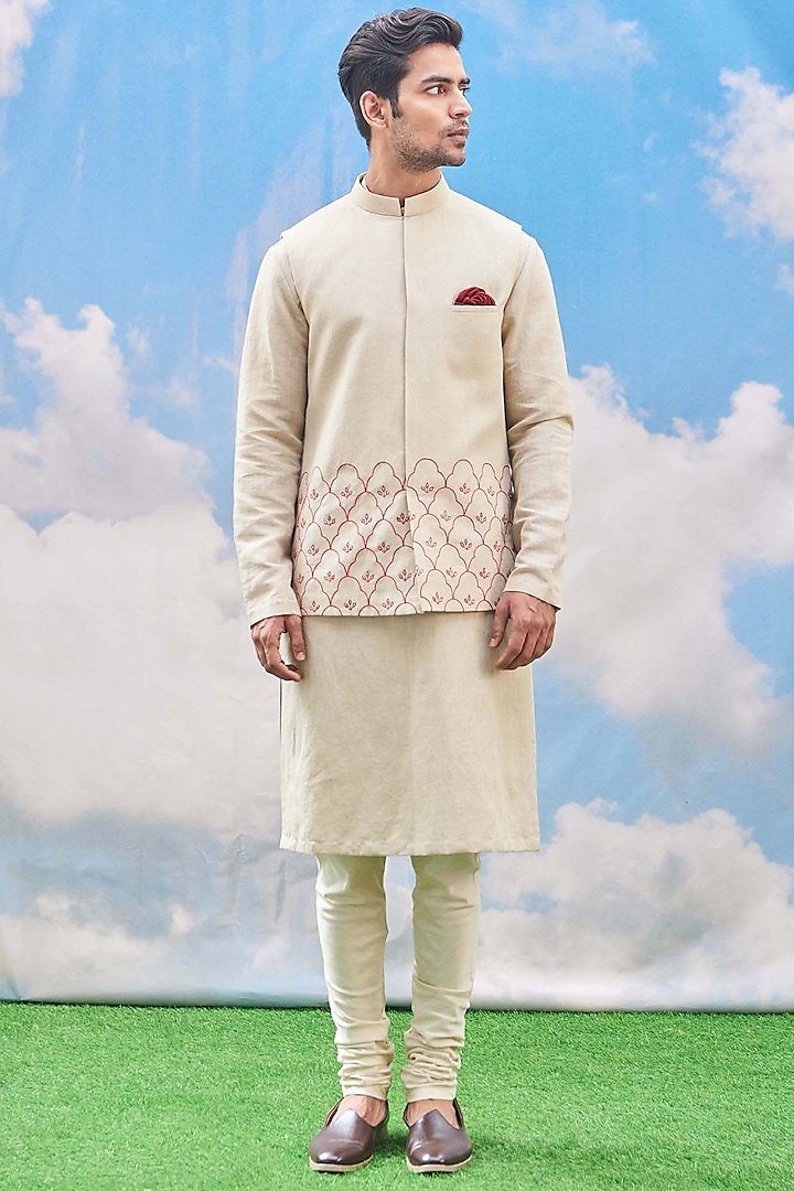 Stone Beige Cotton Blend Kurta Set With Bundi Jacket by TISASTUDIO
