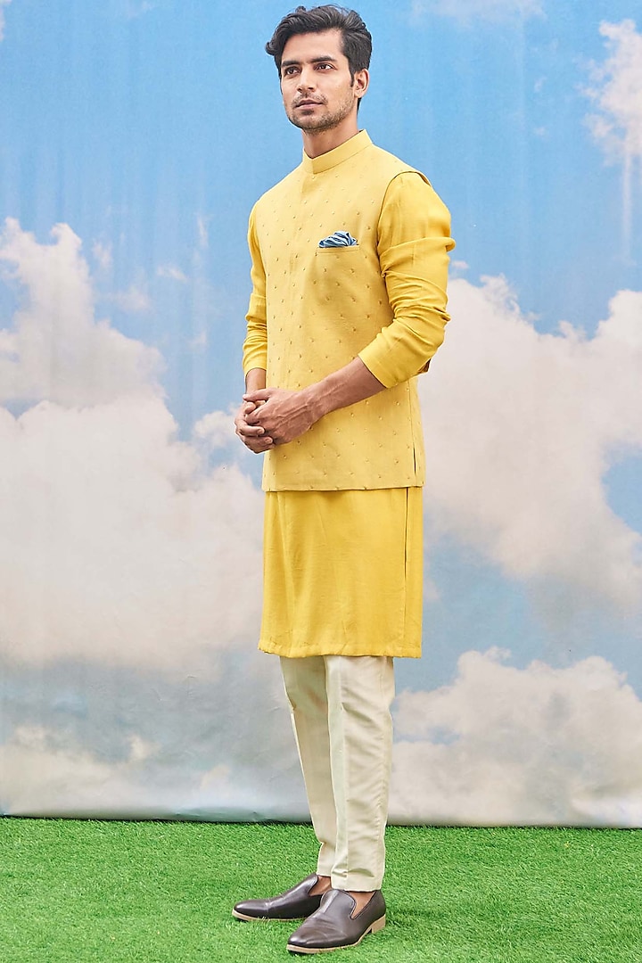 Bright Yellow Kurta Set With Bundi Jacket by TISASTUDIO