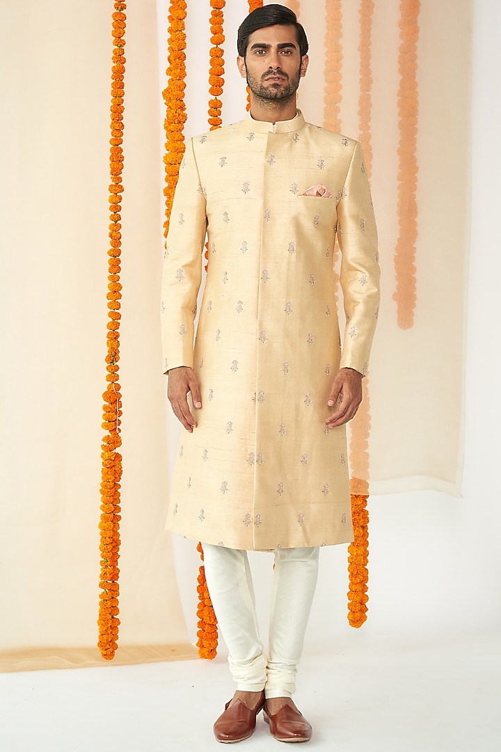 Cream Motif Embroidered Sherwani Set by TISASTUDIO