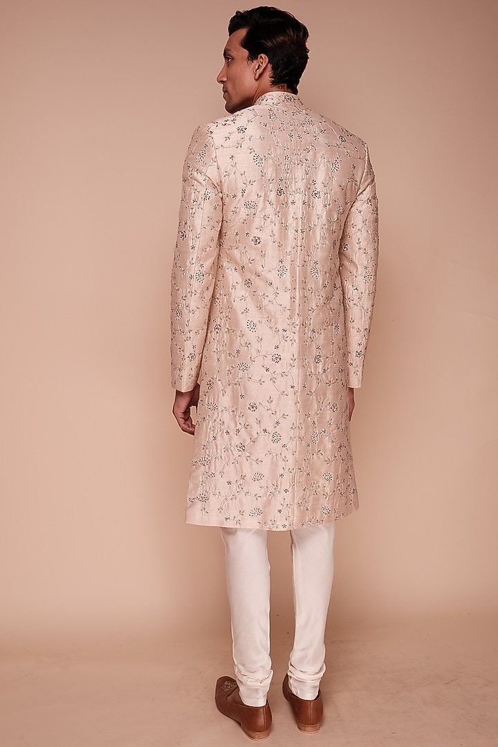 Light Peach Raw Silk Floral Embroidered Groom Sherwani Set by TISASTUDIO at Pernia's Pop Up Shop