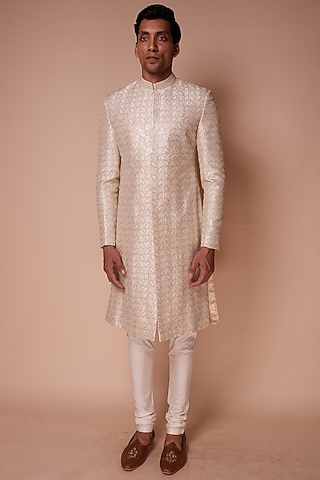 Ivory Raw Silk Embroidered Sherwani Set by TISASTUDIO