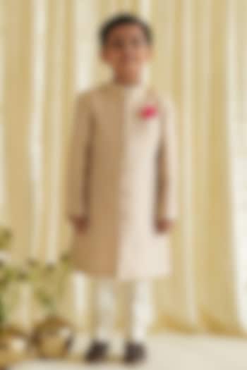 Cream Viscose Brocade Sherwani Set For Boys by Tiber Taber at Pernia's Pop Up Shop