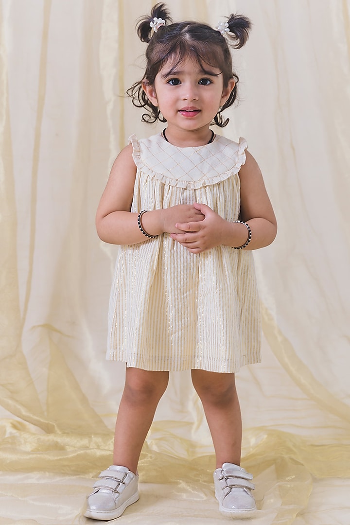 Cream Cotton Lurex Stripes Printed Dress For Girls by Tiber Taber at Pernia's Pop Up Shop