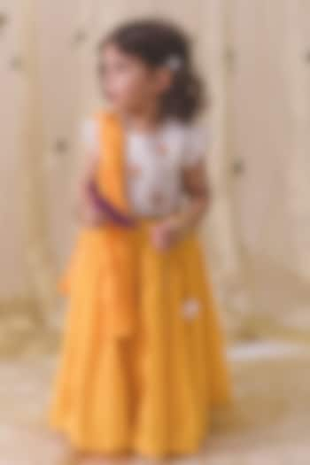 Yellow Cotton Embroidered Lehenga Set For Girls by Tiber Taber at Pernia's Pop Up Shop