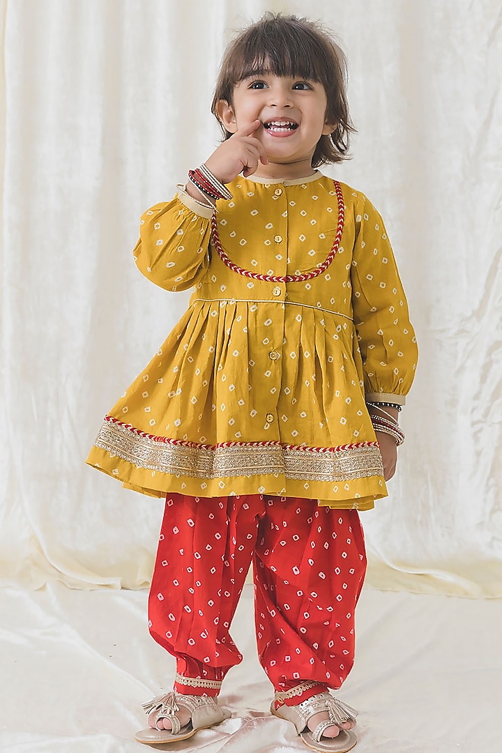 Yellow Soft Cotton Lace Embellished Bandhani Angrakha Kurta Set For Girls by Tiber Taber at Pernia's Pop Up Shop