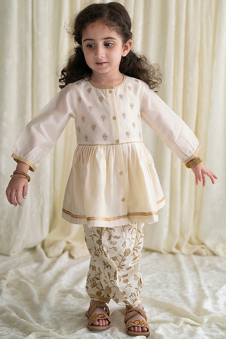 Cream Embroidered Angrakha Kurta Set For Girls by Tiber Taber at Pernia's Pop Up Shop