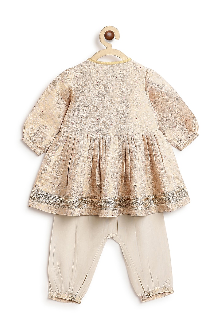 Cream Brocade Kurta Set For Girls by Tiber Taber at Pernia's Pop Up Shop
