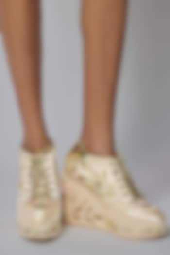 Gold Satin Embroidered Sneaker Wedges by TIESTA at Pernia's Pop Up Shop