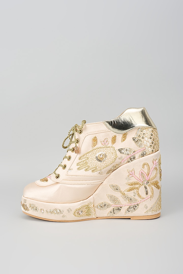 Gold Satin Embroidered Sneaker Wedges by TIESTA at Pernia's Pop Up Shop