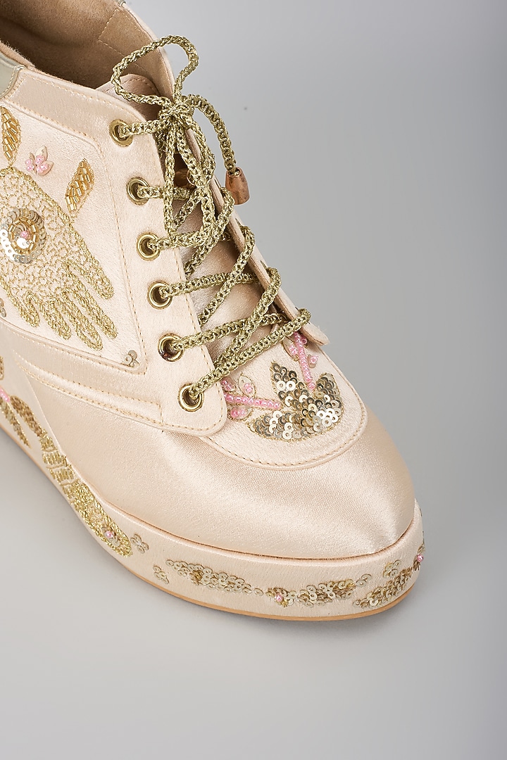 Gold Satin Embroidered Sneaker Wedges by TIESTA at Pernia's Pop Up Shop