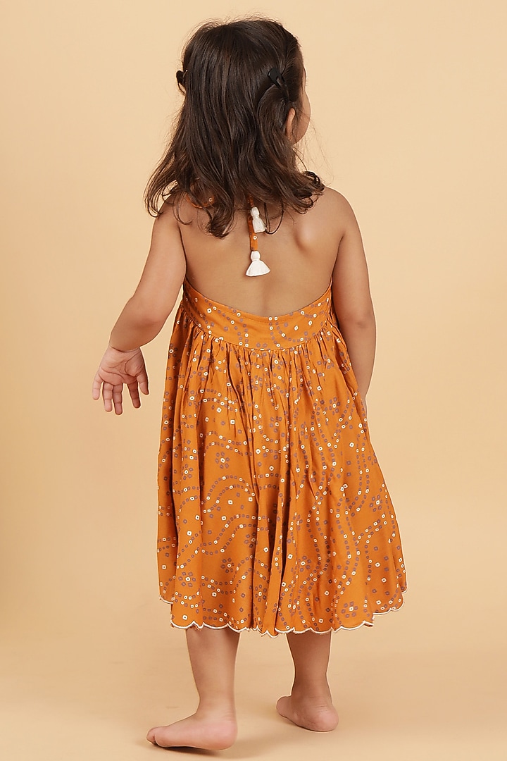 Orange Cotton Bandhani Printed Flared Dress For Girls by Tjori India pvt ltd at Pernia's Pop Up Shop