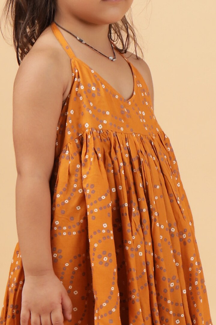 Orange Cotton Bandhani Printed Flared Dress For Girls by Tjori India pvt ltd at Pernia's Pop Up Shop