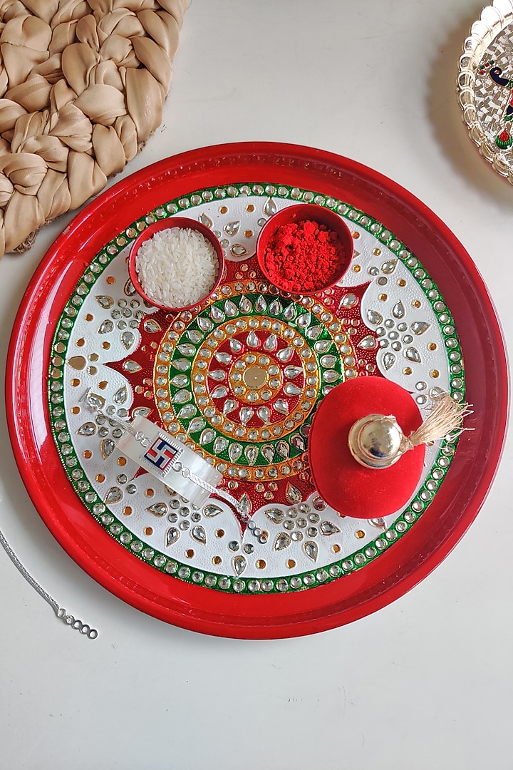 Red Rakhi Pooja Thali by The Khabiyas Trunk by KJ at Pernia's Pop Up Shop