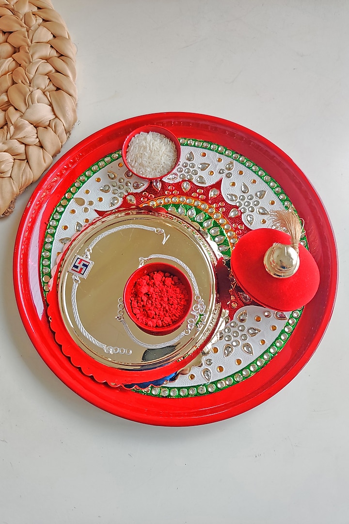 Red Rakhi Pooja Thali by The Khabiyas Trunk by KJ at Pernia's Pop Up Shop
