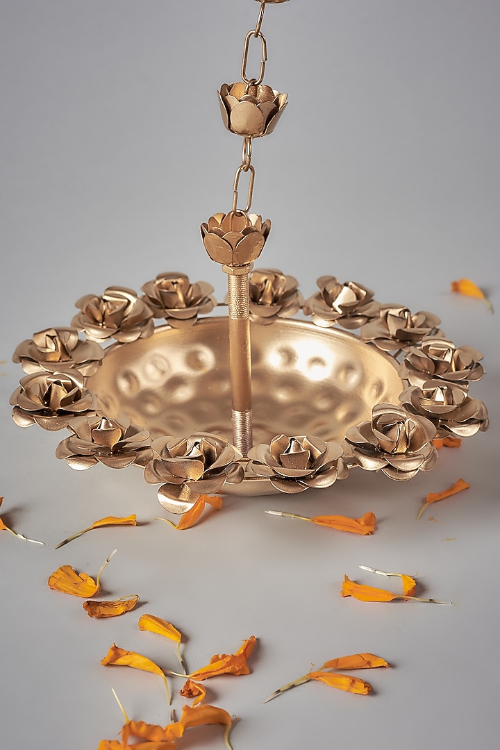 Gold Iron Hanging Diya Urli Set by The Khabiyas Trunk by KJ at Pernia's Pop Up Shop