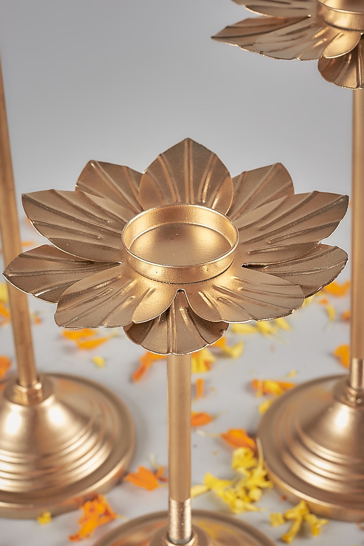Gold Iron Handcrafted Lotus T-Light Holder Set by The Khabiyas Trunk by KJ at Pernia's Pop Up Shop