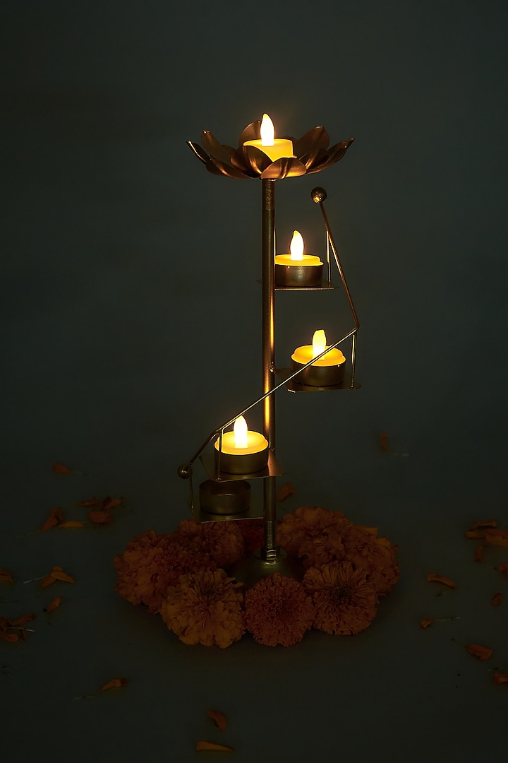 Gold Iron Handcrafted Lotus Ladder T-Light Holder by The Khabiyas Trunk by KJ at Pernia's Pop Up Shop
