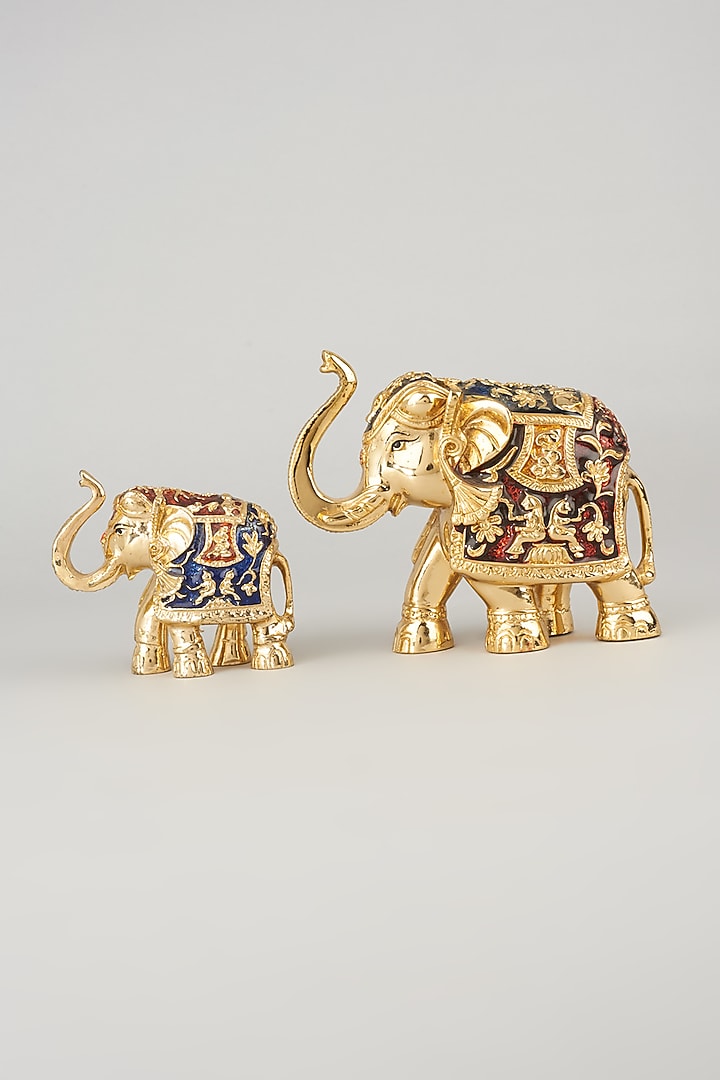 Golden Elephant Sculpture (Set of 2) by The khabiyas trunk by KJ at Pernia's Pop Up Shop