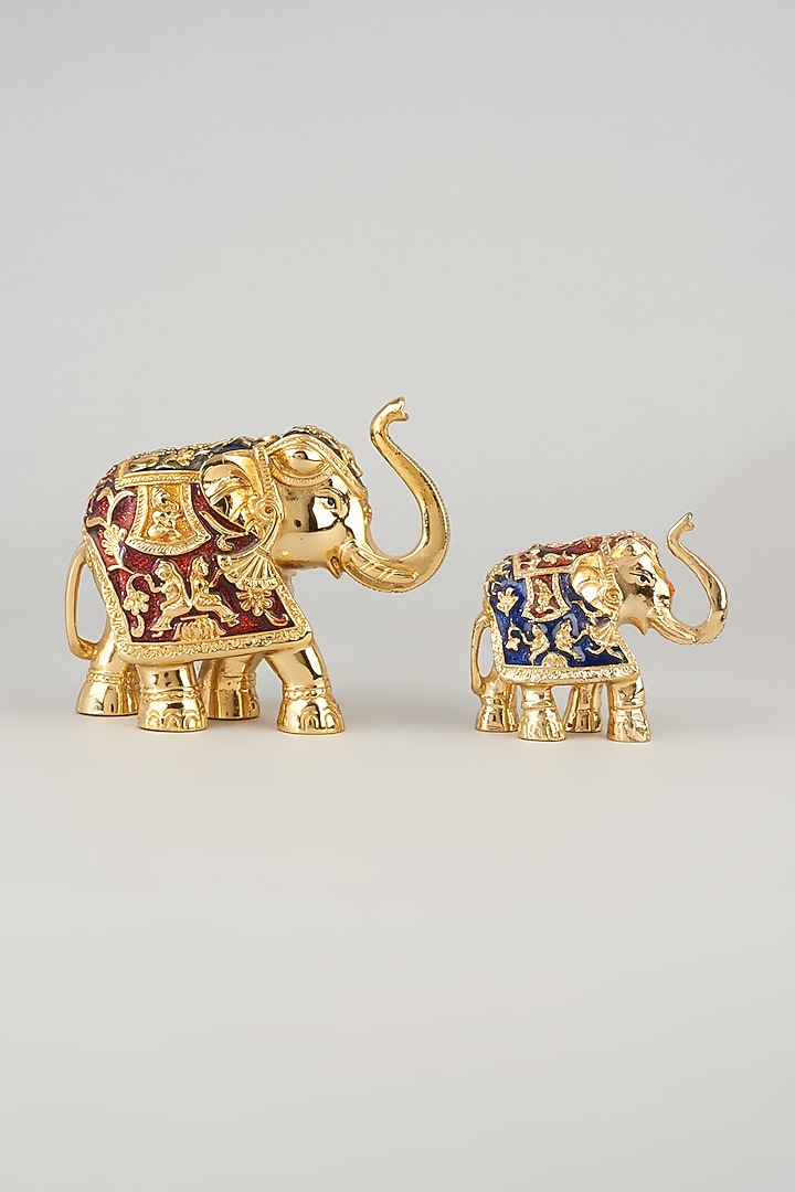 Golden Elephant Sculpture (Set of 2) by The khabiyas trunk by KJ at Pernia's Pop Up Shop