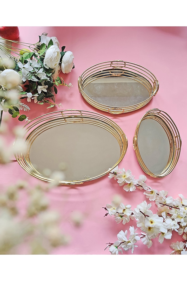 Gold Classic Mirror Oval Tray by The Khabiyas Trunk by KJ at Pernia's Pop Up Shop