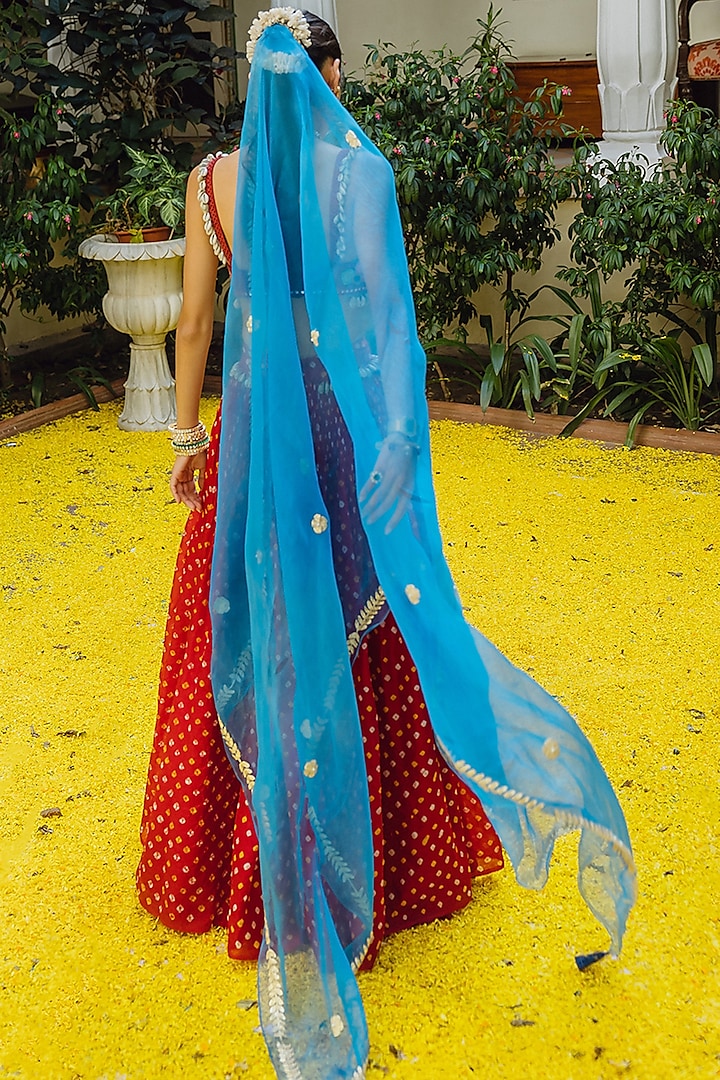 Red Handwoven Silk Bandhani Wedding Lehenga Set by The Little Black Bow at Pernia's Pop Up Shop
