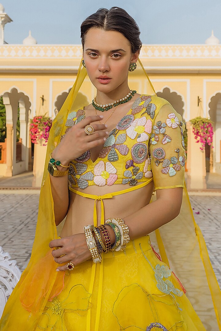Yellow Organza Floral Embroidered Bridal Lehenga Set by The Little Black Bow at Pernia's Pop Up Shop